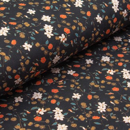 Jersey de coton bio "Night Blossom/fleurs" (noir-blanc/orange) de C.PAULI