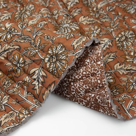 Tissu matelassé en coton "Double face - fleurs" (brun rouille-offwhite/noir)