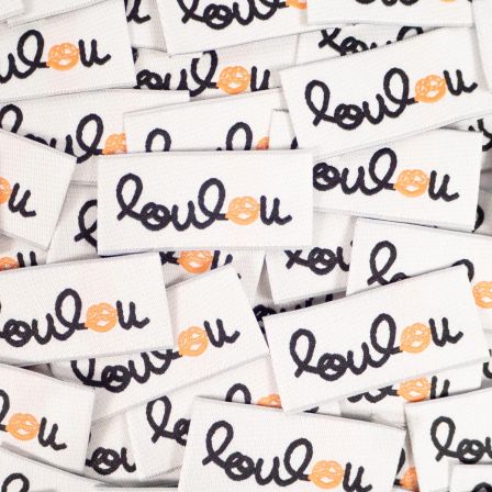 Étiquettes textiles à coudre "Loulou" - lot de 5 (beige clair-noir/orange) de ikatee