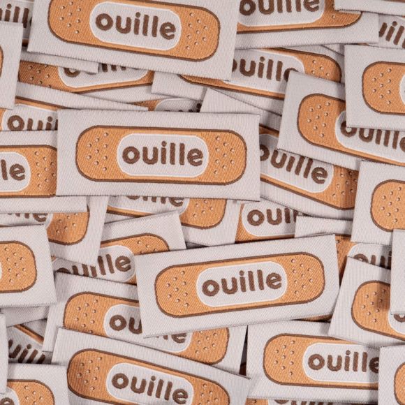 Weblabel/Stoffetiketten "Ouille" - Pack à 5 Stk. (hellgrau-braun) von ikatee