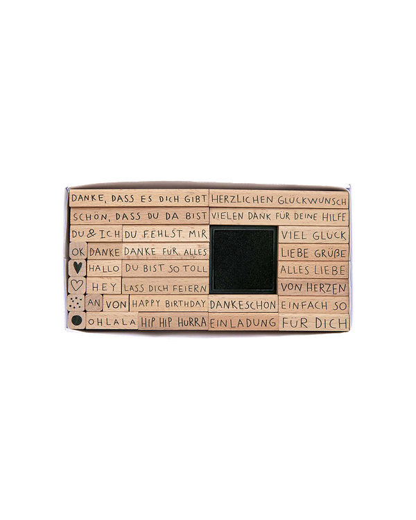 Set de tampons en bois "Textes en allemand avec tampon encreur" - set de 31 pces de RICO DESIGN
