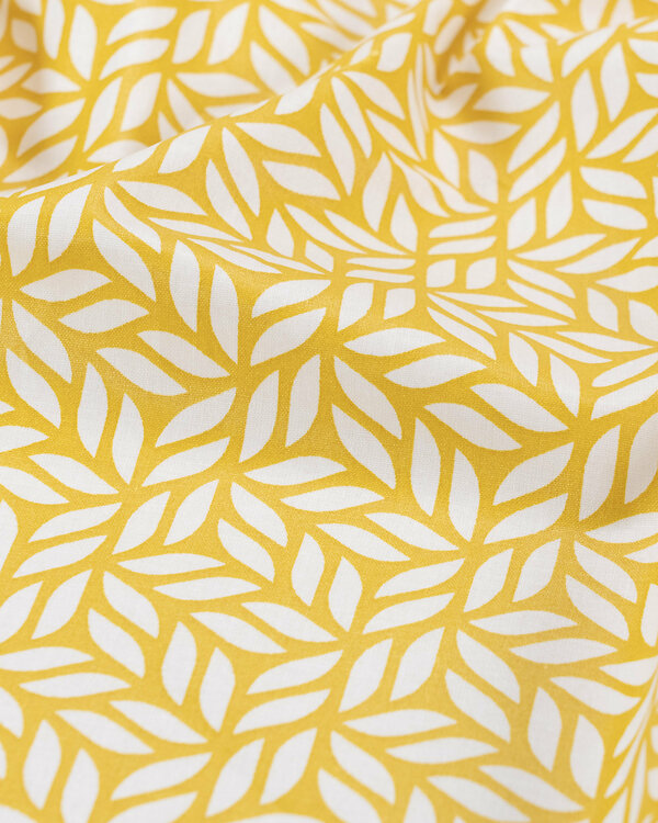 Coton enduit "Mosaïque de feuilles" (moutarde-offwhite)